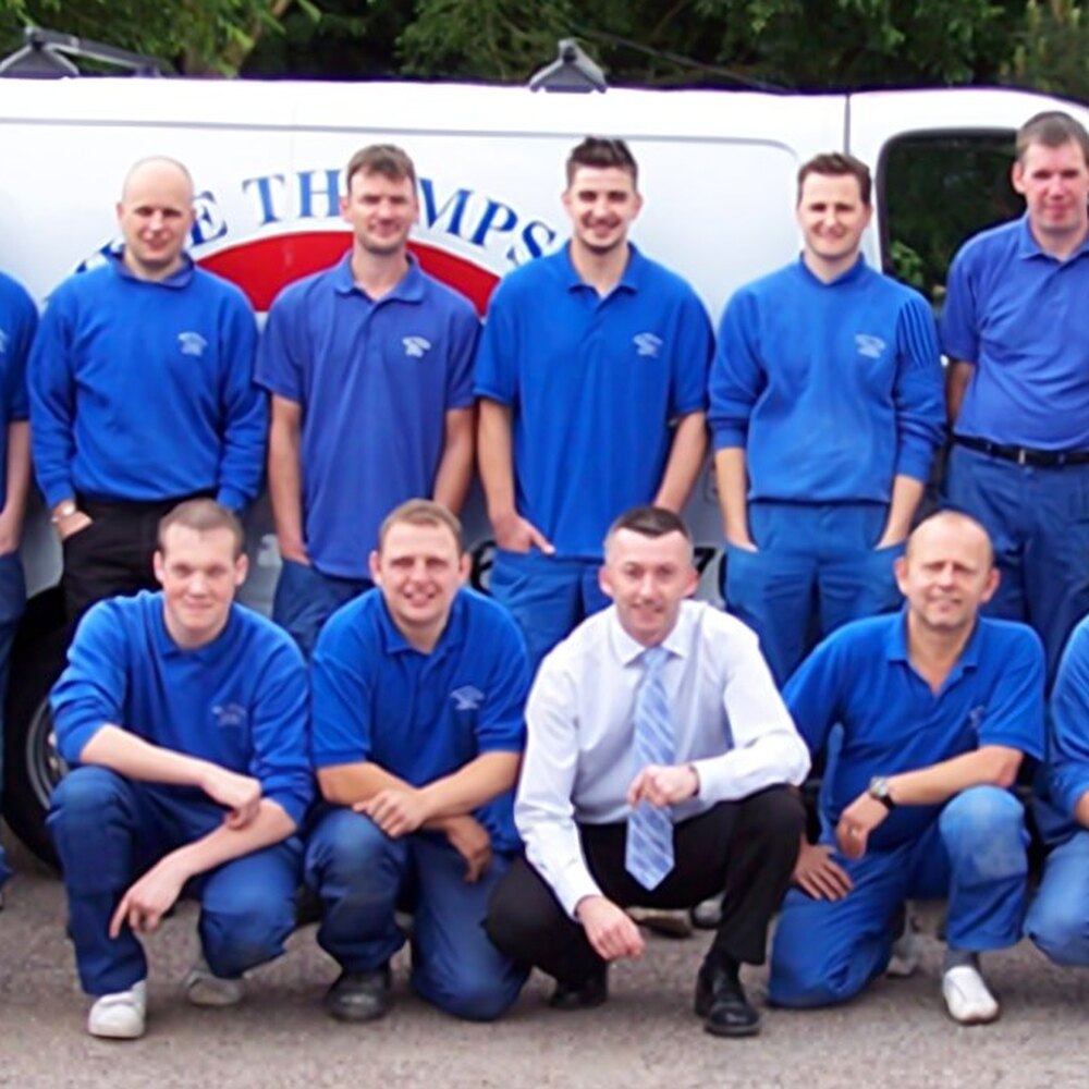 Members of the Mike Thompson Electrical team in company uniform